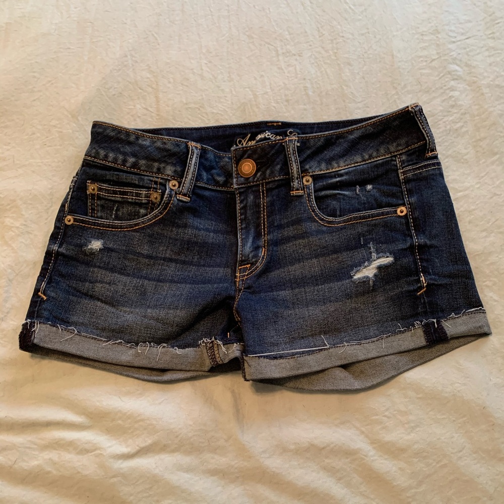 Disarressed cuffed denim shorts